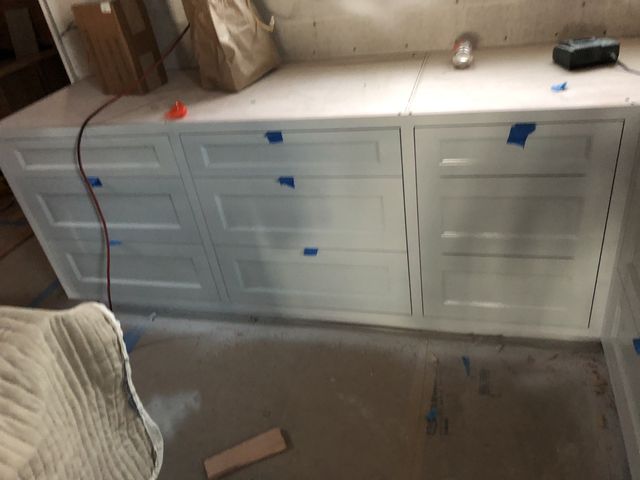 Run of white base cabinets