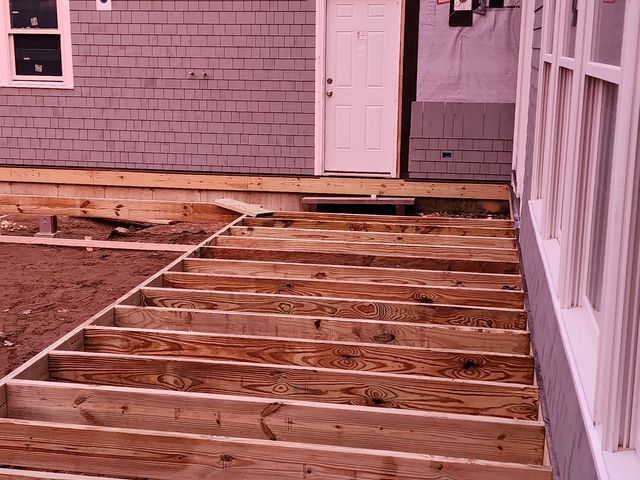 Pressure-treated deck frame