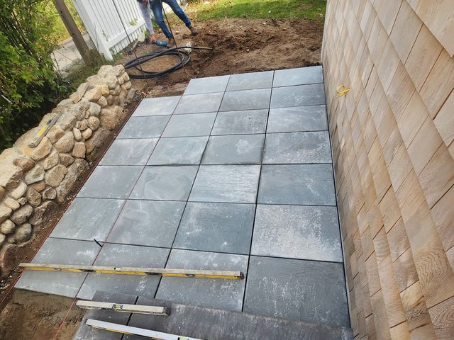 Setting bluestone on a stone dust base