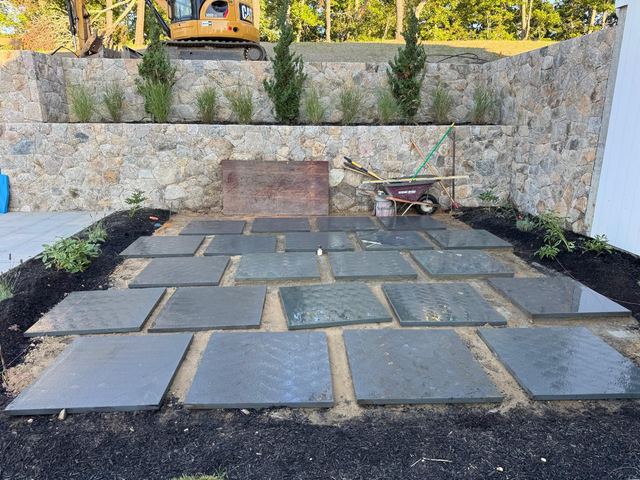 Bluestone pavers set in a walled courtyard