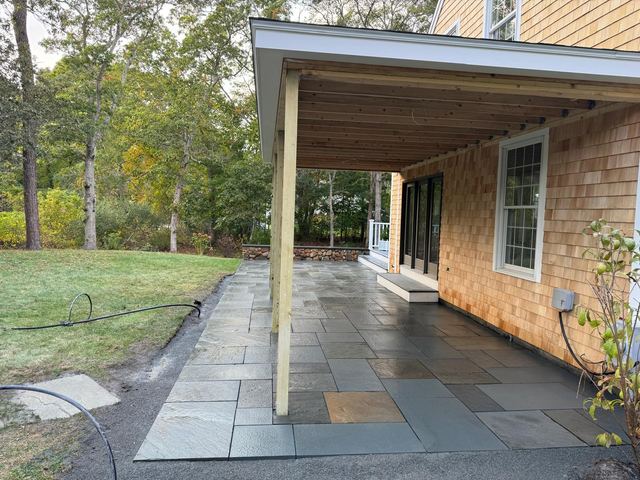 Bluestone patio under a covered porch