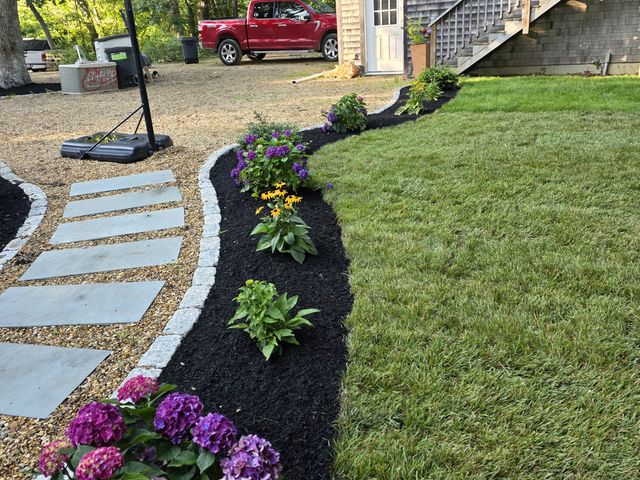 Bluestone stepping-stone path with flowers