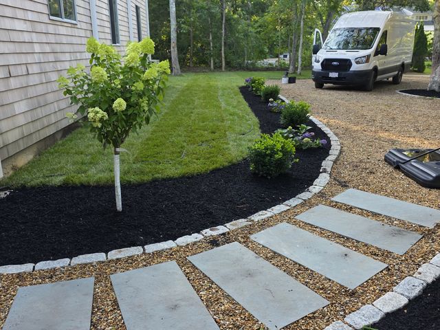Bluestone stepping stones set in gravel