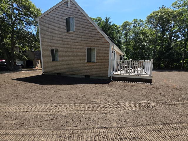 Before: bare graded yard