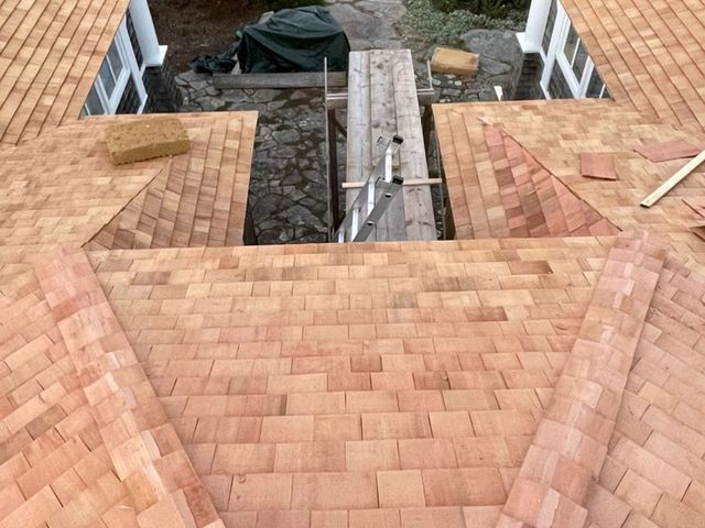 Wood shingle roof valleys