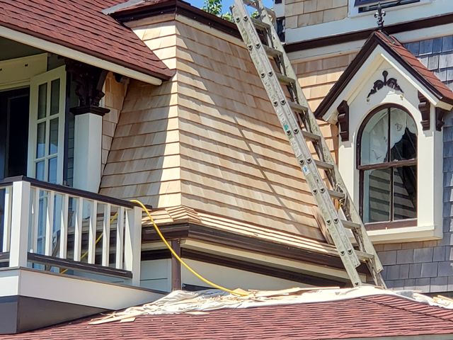 Wood shingle siding on a Victorian-style house