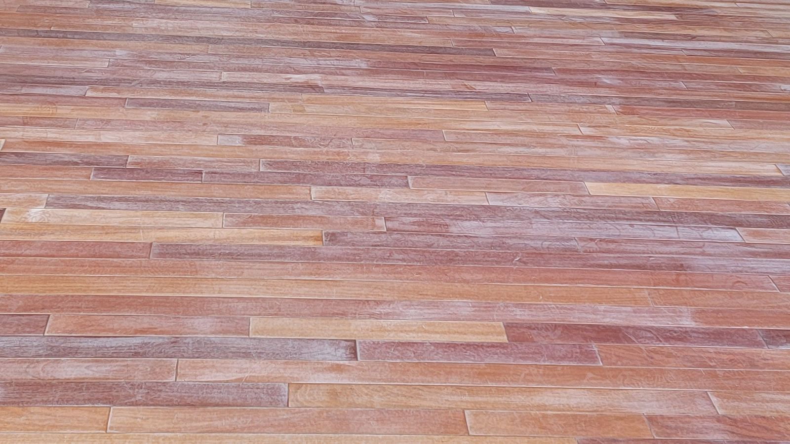 Long room with newly finished wood floors