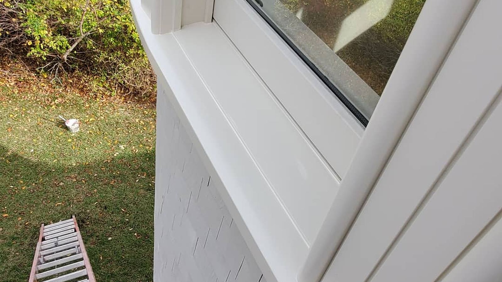Freshly painted white window trim