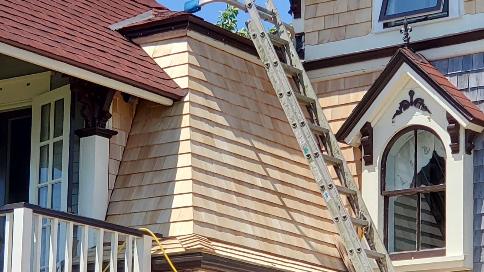 Wood shingle siding on a Victorian-style house